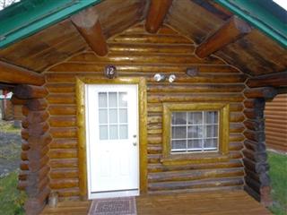 Traditional Log Cabin with Large Windows on the Kenai Peninsula, Alaska - 1