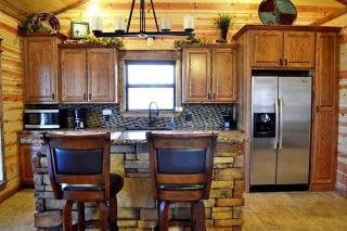 Romantic Cabin Getaway for Two with Hot Tub, Pond & Western Charm in Beavers Bend - 1