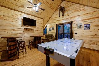 Rustic Two-Story Cabin with Hot Tub, Game Loft & Fireplace Near Broken Bow - 4
