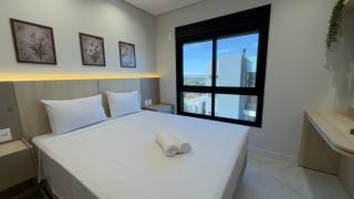 Apartamento novo ao lado do shopping, no centro - 1