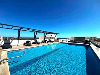 Bahia del Tezal 103b Modern 1BR Retreat with Rooftop Pool & Beach Access - 0