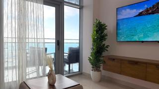 1BR New Alamein Towers - Sea & Lagoon View - North Coast شقة فندقية غرفة و صالة ابراج العلمين الجديدة - فيو بحر دايركت - الساحل الشمالي بجوار Rixos Premium Alamein - 0