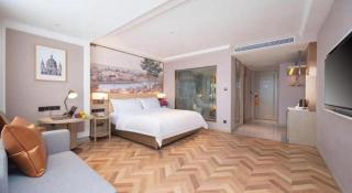 Vienna Hotel Lincang New Asia Pacific Times Square - 1