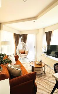Cozy 1BR Corner Apartment with Spacious Balcony at Tambuli Seaside Resort - 0