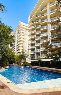 Cozy 1BR Corner Apartment with Spacious Balcony at Tambuli Seaside Resort - 8