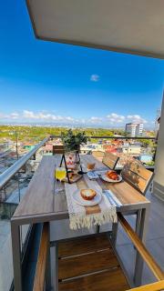Cozy 1BR Corner Apartment with Spacious Balcony at Tambuli Seaside Resort - 2