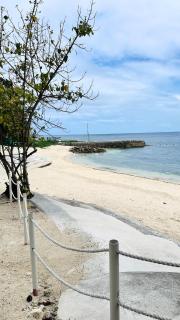 Cozy 1BR Corner Apartment with Spacious Balcony at Tambuli Seaside Resort - 1