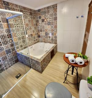 Pousada Bliss House - Opções de suites com hidromassagem - 7