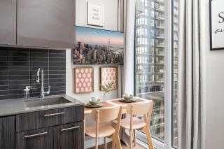 Modern Downtown Studio with Balcony & City Views - 8