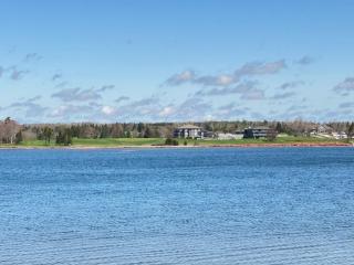 Cedarway Riverview Lodge-by Brudenell River overseeing golf course - 1