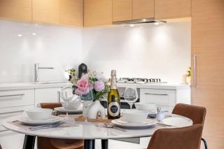 Skyline Escape 2BR Apt Crown with Pool & Free Tram - 1