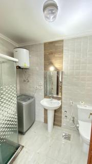 sleek 3 bedrooms flat in new allamein city - 5