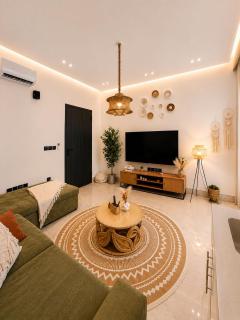 One bedroom and a living room with a bohemian style - 0