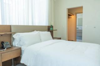 One-Bedroom Apartment with Coastal and City Views - 3