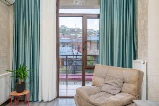 Cozy Saburtalo Stay with Balcony View - 9