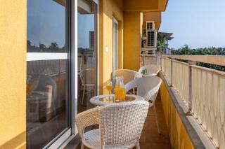Modern 2BHK w Balcony & Pool near Candolim Beach by HIREAVILLA - 1