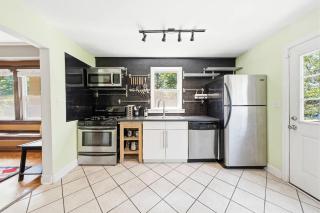 Charming 4BR Retreat w Patio Sunroom - 1