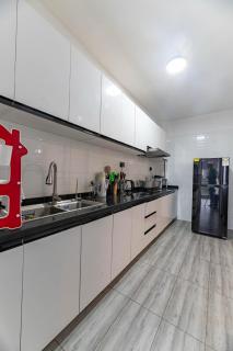 serenity heights three bedroom apartment with swimming pool fully equipped gym ample parking space child play area and amazing scenic city views - 4