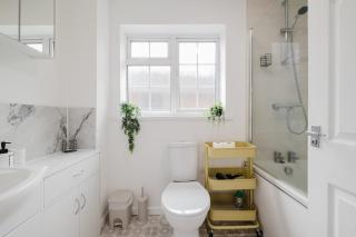 Spacious 4-Bed Home with Free Parking - 4