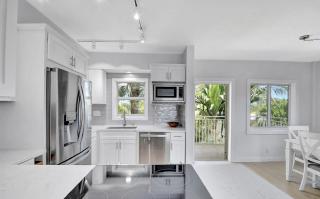 Two Bedroom Waterfront Residence with Pool Views - 3