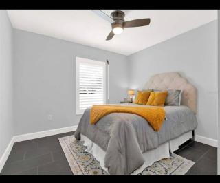 Enjoy a relaxing coastal getaway at this and comfortable 4-bedroom home in New Smyrna Beach, located in a great area just minutes from the ocean. Perfect for families, groups, and vacationers, the property features great WiFi, a private swimming poo - 0