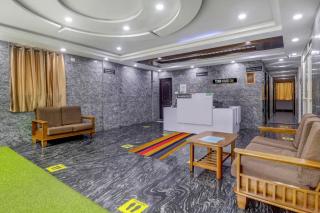 Townhouse OAK SRK White Inn Near Ragigudda Sri Prasanna Anjaneyaswamy Temple - 1