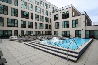 Modern 2BR OTR Pool, Gym, Prime Location - 5