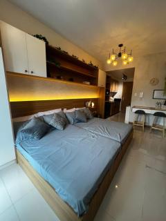 Condo in Red Residences -Self Check-in - Fast Wi-Fi - 6