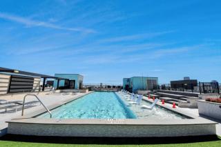 Houston Luxury Apartment Features a rooftop pool city views and king-size beds - 9