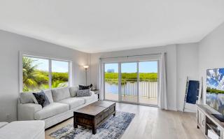 Two Bedroom Waterfront Residence with Pool Views - 0
