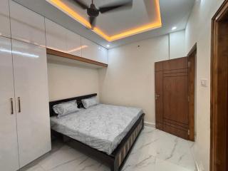 Glaxio Homestay, New Spacious 2BHK apartments in Tirupati Near Railway Station with fully equipped kitchen, AC bedrooms, 24 hours water, caretaker service, and ample space for Car Parking & ideal for Families and Pilgrims - 9