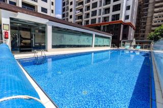 serene stays apartment with fully equipped gym , heated swimming pool ,private parking space and amazing scenic views - 4