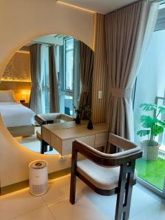 BRAND NEW unit in Uptown BGC with Balcony 55 Inch smart TV and 300Mbps WiFi, with Workspace, Beside Landers, near Uptown Mall and Mitsukoshi Mall - 9