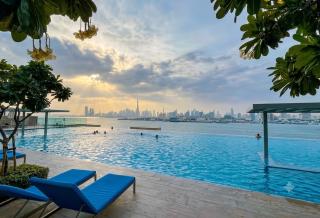 Vogue Vacation Homes, Creek Harbour The Grand Waterfront Living close to Downtown, Burj Khalifa and Dubai Mall, Two Bedroom Apartment with Balcony, Canal and Vibrant Community View, Access to all Amenities - 0