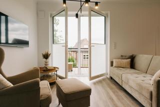 Küsten Suite de Diek - Suite 2 direkte Deichlage, Hafenblick, Balkon, 77qm - 9