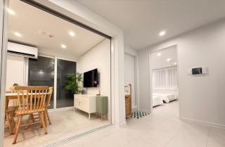 Free airport drop-off for stays of 7 nights or more , elevator Available , Free luggage storage , 6-minute walk to Gunja Station , 3-minute walk to the airport bus - 4