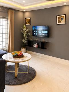 Modern 1BHK in Bahria Town Lahore with TV Lounge - 0