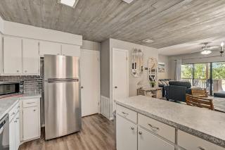 Dog-Friendly Water View Condo with Inviting Porch, AC, W/D, & Modern Charm - 2