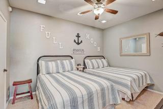 Dog-Friendly Water View Condo with Inviting Porch, AC, W/D, & Modern Charm - 1