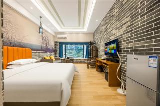 Yumi Huanju Apartment -广州东站 燕塘地铁站店 - 1