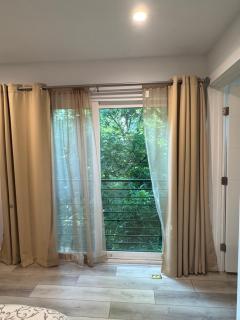 1 full bed with EnSuite bath surrounded by greenery - 1