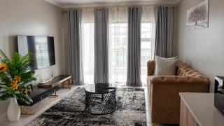Stylish 1BR at The Blyde Crystal Lagoon Resort - 0