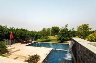 ELIVAAS Signature Stone Age Home Fernwood 6-BHK Stone-Clad Estate with Bamboo Cottages, Private Pool, Gazebo & Terrace Garden - 0