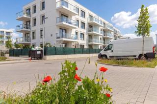 Comfortable Apartment with Balcony Workspace and Underground Parking by Noclegi Renters - 5