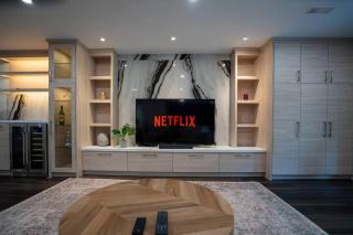 Modern 3BR Basement Retreat with Workspace & Parking - 4