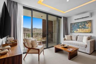 Cozy Modern Condo with Scenic Balcony Views - 2