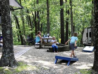 Rustic Camper Retreat with Fire Pit & Rocking Chairs in Branson, Missouri - 3