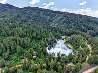 Historic Cabins with Lake Views & Private Fishing Dock in Swan Valley, Idaho - 4
