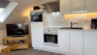 Kapitänshaus FeWo 4 / Ferienwohnung Strandrobbe 4 - 5