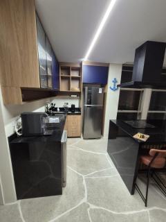 Oceanfront Design Apartment Guarujá - 9